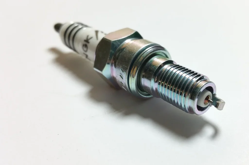 How Do Spark Plugs Break Glass So Easily?